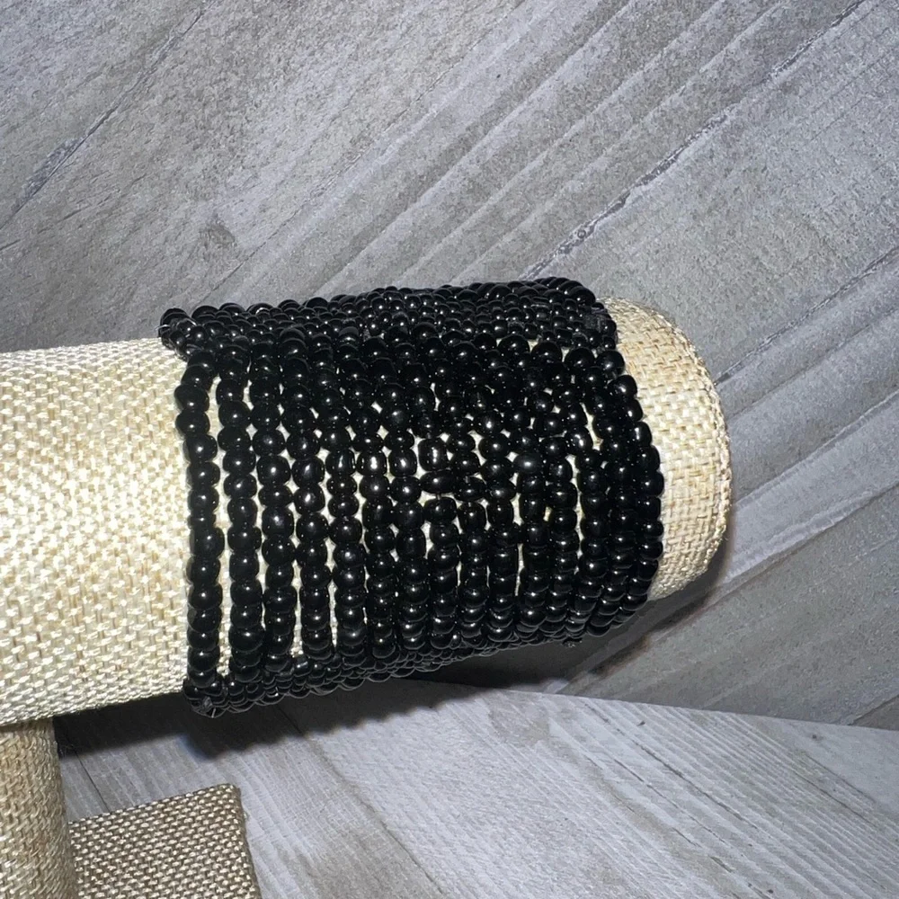 4 black bracelets